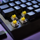 Easily swap Razer’s default keycaps atop its Yellow Switches for your own.
